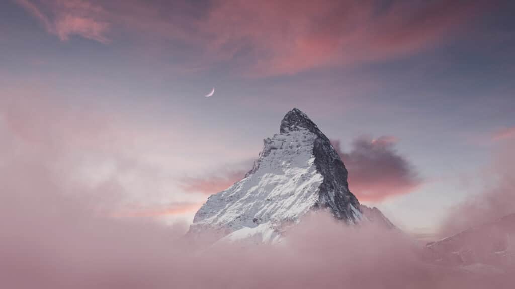 view to the majestic Matterhorn mountain with crescent moon in the evening mood