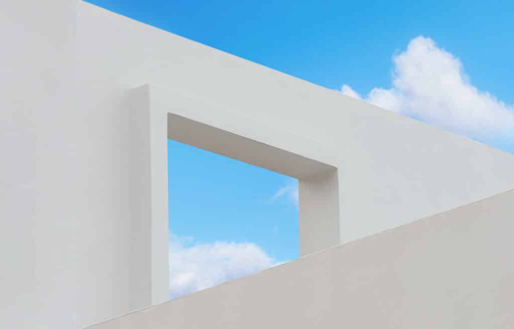 all texture of concrete with open window against blue sky and c